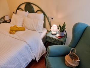 A bed or beds in a room at a 2 min de la Catedral