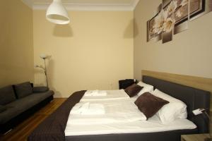 Postel nebo postele na pokoji v ubytování Hotel Elegia am Kurfürstendamm