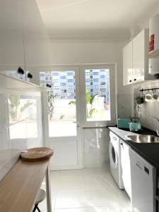 Kuchyň nebo kuchyňský kout v ubytování Costa Beach