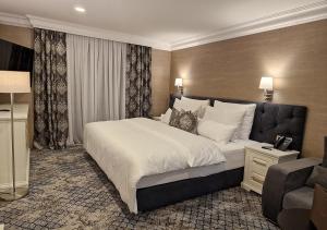 Posteľ alebo postele v izbe v ubytovaní Boutique Hotel Bora & Villas Garamm