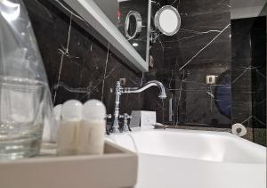 Kúpeľňa v ubytovaní Boutique Hotel Bora & Villas Garamm