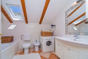 Koupelna v ubytování Apartment Varina + 26 fotografií