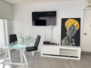 A television and/or entertainment centre at Beachside Mooloolaba