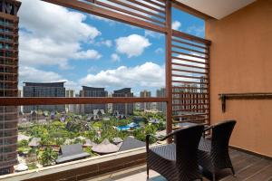 A balcony or terrace at Mangrove Tree Resort World Sanya Bay-Coconut