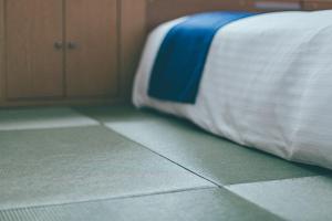 Letto o letti in una camera di Hamilton Hotel Blue