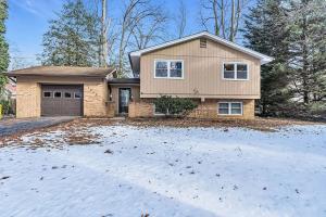 a house with a driveway in the snow at Private Single Family Home Close to Both Water and Downtown! in Annapolis
