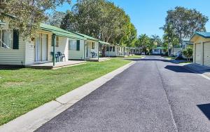 a street of houses in a residential neighborhood at Glen Villa Resort in Byron Bay