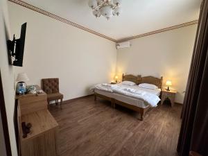 Old Bukhara Boutique客房内的一张或多张床位
