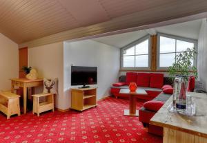 Posezení v ubytování Hotel "Haus am Berg"