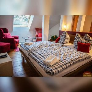 Postel nebo postele na pokoji v ubytování Hotelpension Pfarrhaus