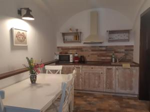 A kitchen or kitchenette at Kálium Vendégház