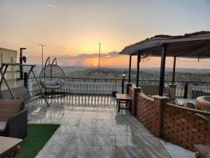 Kép Private Oasis Panoramic Pyramids View RelaxJacuzzi szállásáról ‘Ezbet `Abd el-Ḥamîd városában a galériában