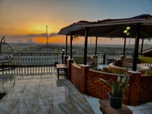 Kép Private Oasis Panoramic Pyramids View RelaxJacuzzi szállásáról ‘Ezbet `Abd el-Ḥamîd városában a galériában
