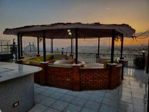 Kép Private Oasis Panoramic Pyramids View RelaxJacuzzi szállásáról ‘Ezbet `Abd el-Ḥamîd városában a galériában Még 15 kép