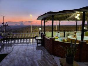 Kép Private Oasis Panoramic Pyramids View RelaxJacuzzi szállásáról ‘Ezbet `Abd el-Ḥamîd városában a galériában