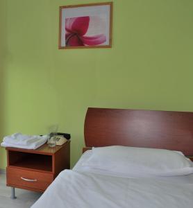 Postel nebo postele na pokoji v ubytování Bed and Breakfast Kogoj