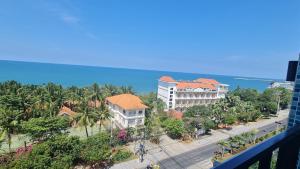 a view of the ocean from the balcony of a resort at Phúc Thắng Hotel in Phú Quốc