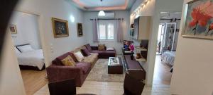 A seating area at Flora's Boutique Apartment at the heart of Corfu