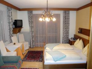 Postel nebo postele na pokoji v ubytování Pension & Appartement Steinwender