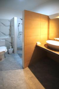 a bathroom with a sink and a toilet at Jeboutiquelangsuan hotel in Lang Suan