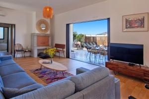 Posedenie v ubytovaní Villa avec piscine bbq pétanque Calme à 5km de la plage de sable de Calvi