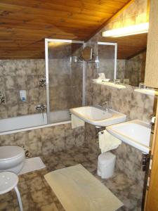 Koupelna v ubytování Pension & Appartement Steinwender