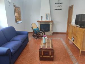 a living room with a couch and a coffee table at 10A04 Casa Petacos in Pravia