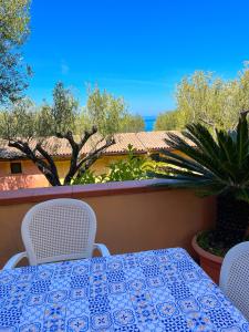 A balcony or terrace at NaturAmare Apartments Palinuro