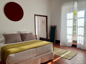 A bed or beds in a room at Finca El Azahar