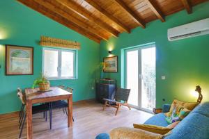 Posezení v ubytování Fede - Danilia Cottages