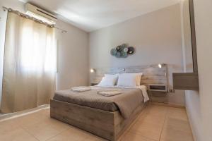 Posteľ alebo postele v izbe v ubytovaní Serenity Villa