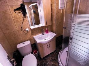 Koupelna v ubytování Figen Suite Hotel 2