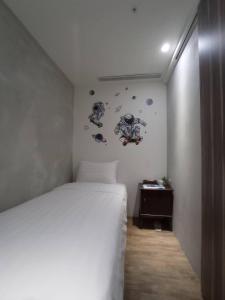 Letto o letti in una camera di Meworld Hotel - Daan