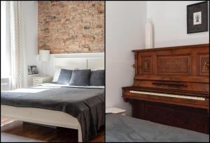 Posteľ alebo postele v izbe v ubytovaní Piano Apartment w sercu Starego Miasta