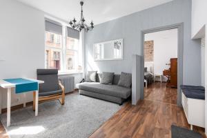 Posedenie v ubytovaní Piano Apartment w sercu Starego Miasta