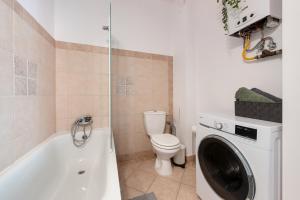 Kúpeľňa v ubytovaní Piano Apartment w sercu Starego Miasta
