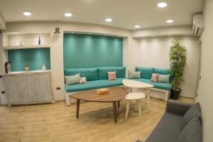 Χώρος καθιστικού στο Connect Suites