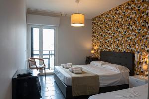 Posteľ alebo postele v izbe v ubytovaní B&B Bellavista