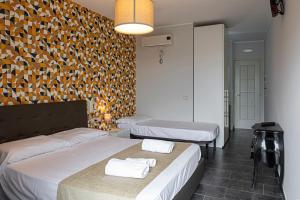 Posteľ alebo postele v izbe v ubytovaní B&B Bellavista