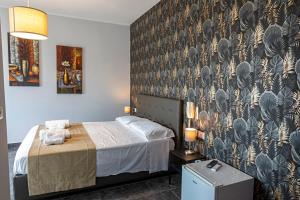 Posteľ alebo postele v izbe v ubytovaní B&B Bellavista