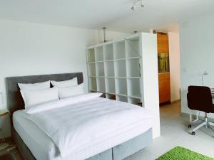 Postel nebo postele na pokoji v ubytování N1 Standalone House Baden