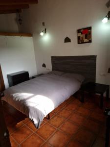 Ein Bett oder Betten in einem Zimmer der Unterkunft Casa El Banco