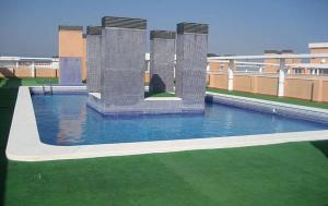Bazén v ubytování MAR DE OROPESA DREAMS PLAYA DE LA CONCHA nebo v jeho okolí