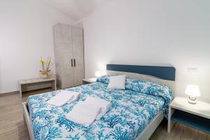 Postel nebo postele na pokoji v ubytování Agriturismo Fusini + 37 fotografií
