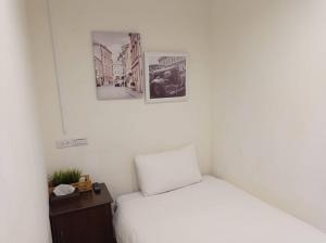 Letto o letti in una camera di Meworld Hotel - Daan