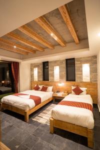 Uma cama ou camas num quarto em Hotel Mera Peak Private Limited
