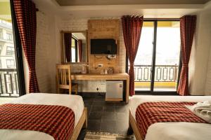 Uma cama ou camas num quarto em Hotel Mera Peak Private Limited
