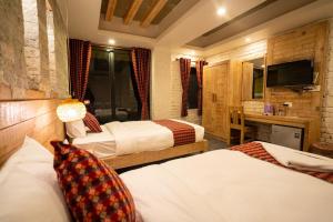 Uma cama ou camas num quarto em Hotel Mera Peak Private Limited