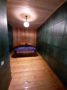 Postelja oz. postelje v sobi nastanitve Guest House Gvidani
