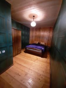 Postelja oz. postelje v sobi nastanitve Guest House Gvidani